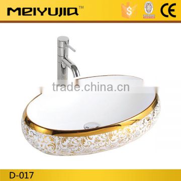 Bathroom oval ceramic golden wash basin