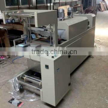 Fully automatic heat shrink packing machine