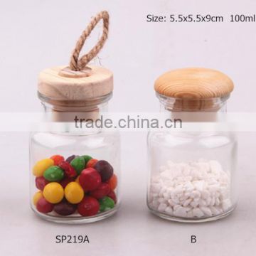 glass spice jar with 2 different wood lid