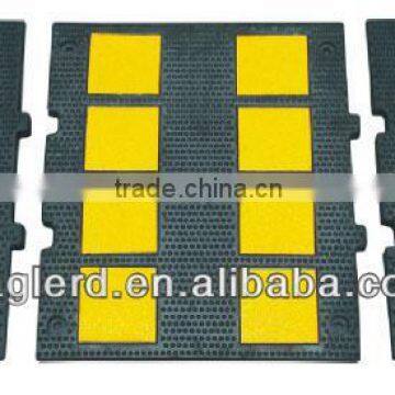 Durable reflective plastic speed bumps