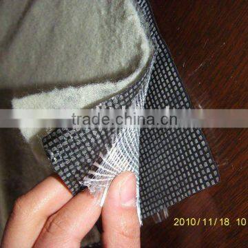 Knitted composite geomembrane