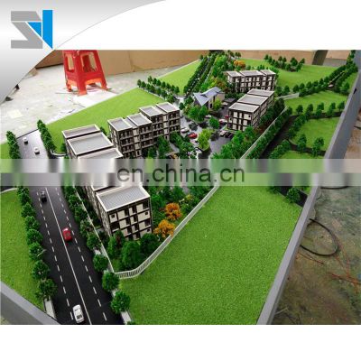 High rise residential model with miniature trees, Home building model
