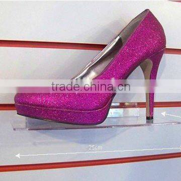 Bright acrylic shoe display for retail sale