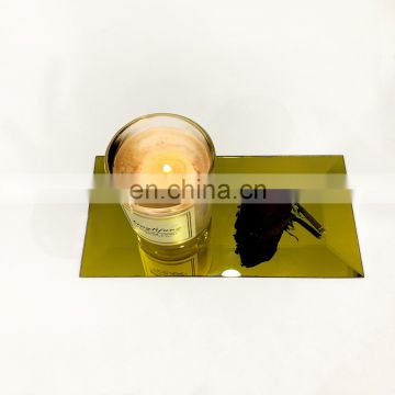 glass mirror tray, candles and wall decor