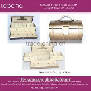 golden portable jewelry box with many compartments