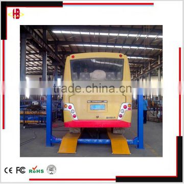 Four post maintenance car lift with rolling jack