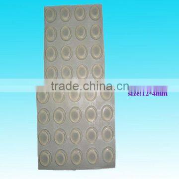 Rubber foot with adhesive