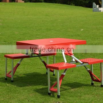 Portable plastic folding table and chairs red tables