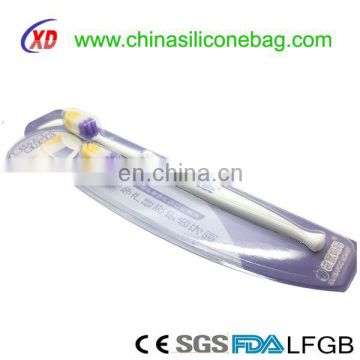 Clean silicone toothbrush for the baby's teeth