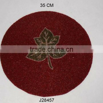 Red Glass bead place mats with leaf pattern other colours also available