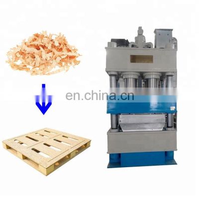 Wood Pallet Use Hydraulic Hot Press Machine for Wood Waste Recycling Machinery Engineers Available to Service Machinery Overseas