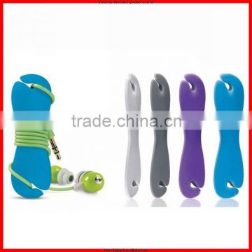 Bone shape magic earphone silicone cable winder made in china