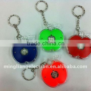 New design apple shaped plastic keychain with led