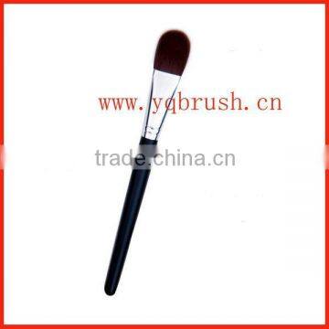 Round foundation brush with black wooden handle