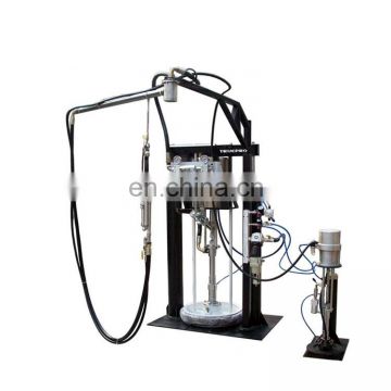 Manual two pump component sealant spreading machine