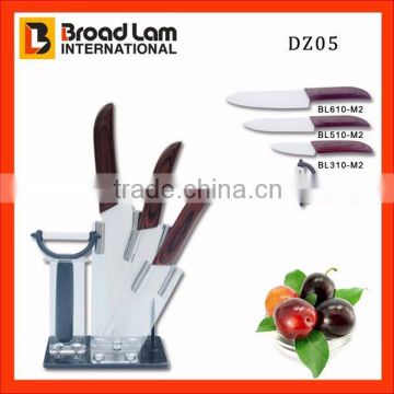 3pcs Ceramic Kitchen knives set with wooden handle plus a ceramic peeler in acrylic knife stand