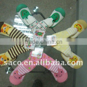 Fashion children's leather sole sock with the cartoon pattern on it