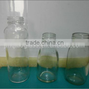 various empty clear glass milk bottle
