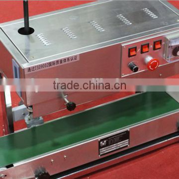 Plastic film continuous sealing machine
