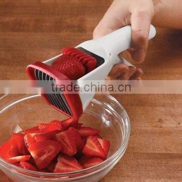 Handheld strawberry slicer