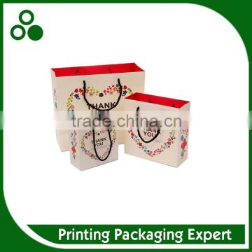 LUXURY CREATIVE HOT SALE CHINESE FULL COLOR PRINTING PAPER SHOPPING BAG WITH ROPE HANDLES