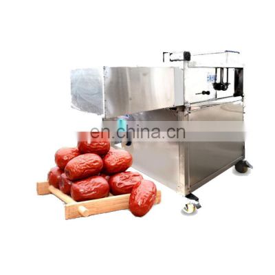 Machines for stoning fruit or removing seeds