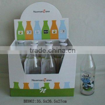 glass bottle with decal used for storage milk