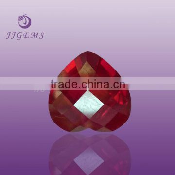 Faceted synthetic blood red ruby corundum gemstone
