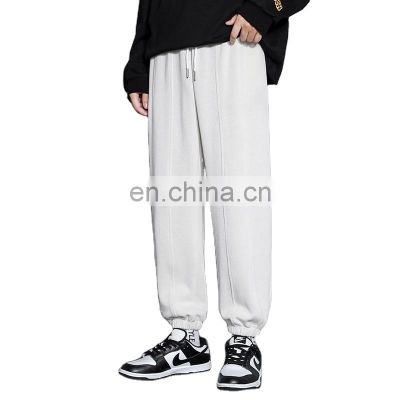 Wholesale custom brand LOGO men and women mixed loose leggings nine-point sports pants spring and autumn trousers