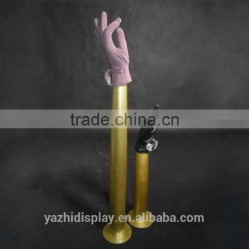 Fashion jewelry and gloves display female mannequin hand