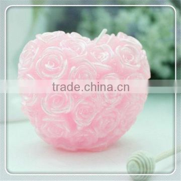 carved flower candle