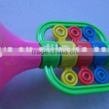 small plastic toys trumpet