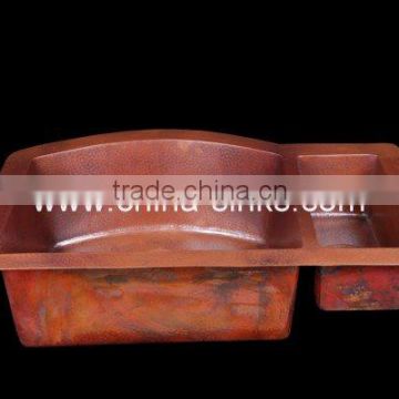Hand hammered copper sink