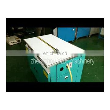Semi automatic carton box packing machine automatic strapping machine
