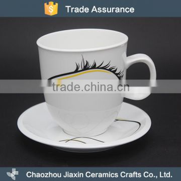 White decal modern ceramic coffee cup and saucer                        
                                                                                Supplier's Choice