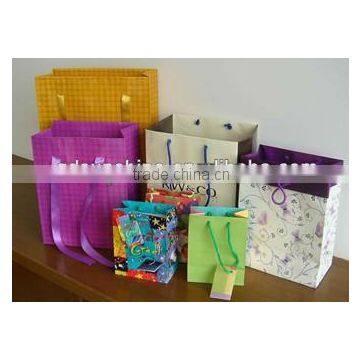 cheapest &free sample &high quality paper carry bags with handle made in china