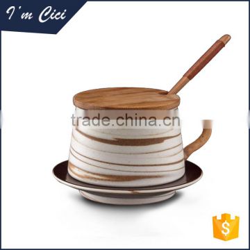 European design ceramic coffee mug with cover and spoon