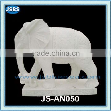 carved outdoor white elephant statues