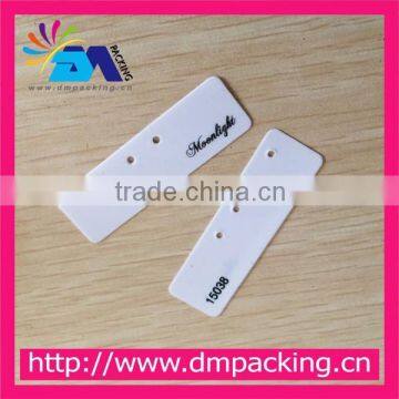 White pvc earring tag with black printed