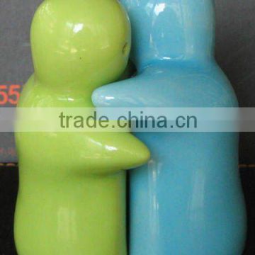 ceramic cruet set green and blue hug salt and pepper shaker