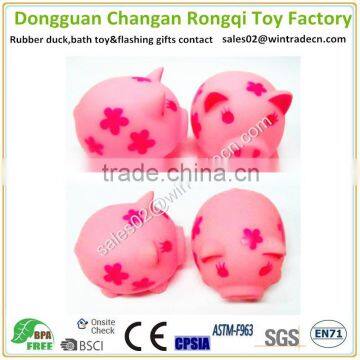 Squeaky pink pig toy make sound with peach blossom logo