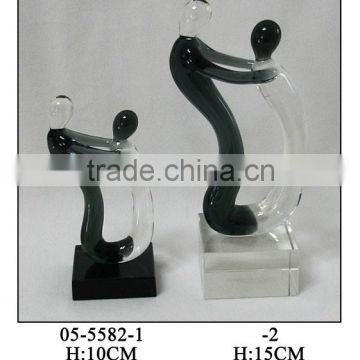 black and clear glass hug figures decoration