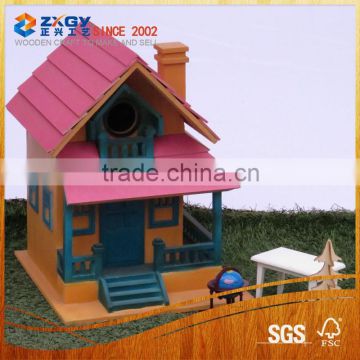 Cute decorated and colorful wooden bird cage hanging wooden bird house