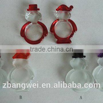 snowman-shaped glass candle holder