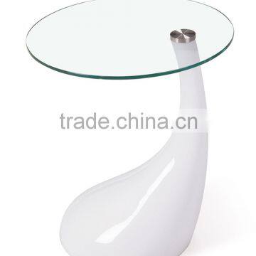 living room glass top and fiberglass base tadpole coffee table