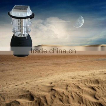 Solar dynamo lantern with mobile phone charger