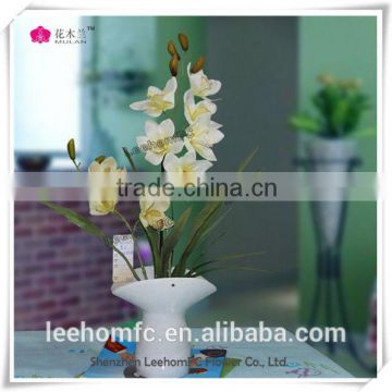 cream artificial orchid for home and office decoration