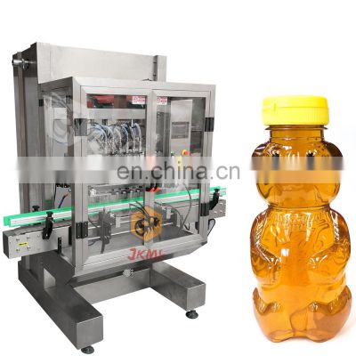 Hot Salt Glass Bottle Piston Honey Filling Machine With Labeling Machine