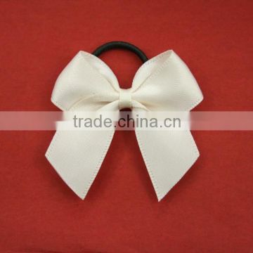 Pre-made white satin ribbon bow