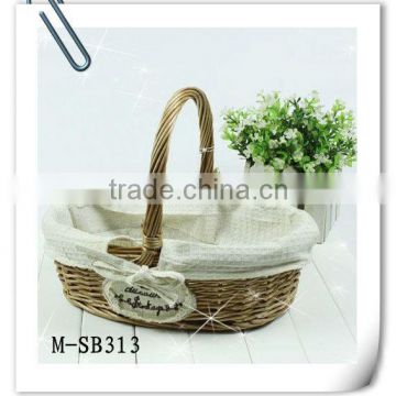 OVAL wicker storage basket with fixed handle